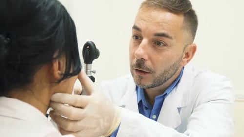 Doctor Examines Patient in Medical Clinic