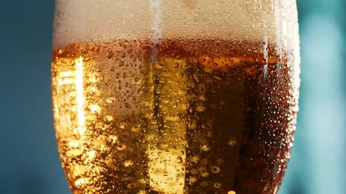 Close Up of Beer in Glass with Condensation