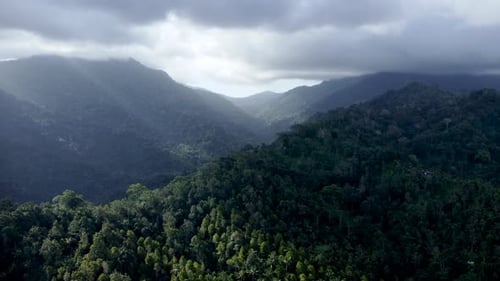 Drone Flying Near Mountains and Volcano