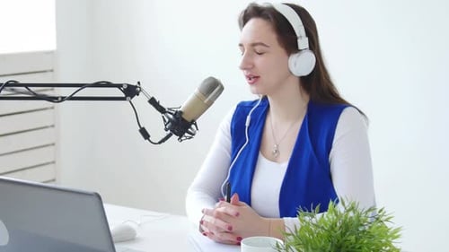 Woman Recording Podcast from Home Studio