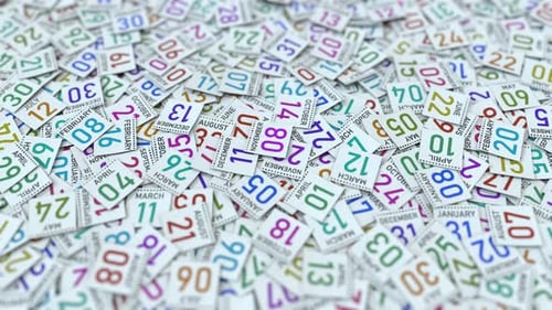 Scattered Calendar Pages Focus on Specific Date