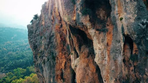 Eroded Rocky Cliff Above Green Mountain Valley
