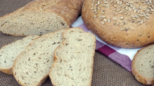 Artisanal Bread Display with Slices and Loaves