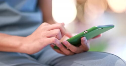 Close up of woman using mobile phone