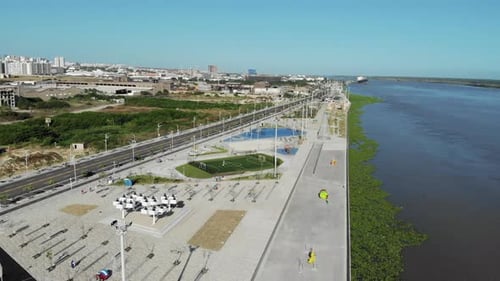 Aerial View of Renovated Riverfront Promenade and Urban Park