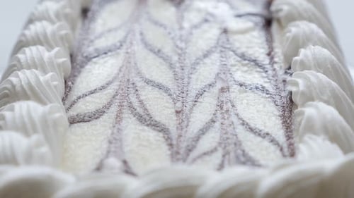 Delicious Decorated Cake with Swirls and Frosting