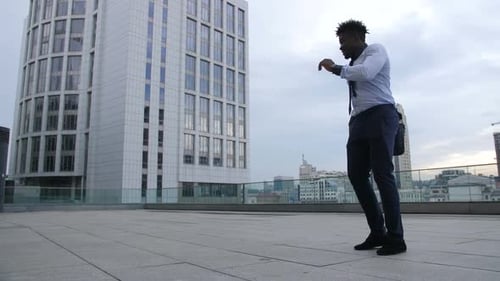 Stylish Young Man Walks in City with Confidence