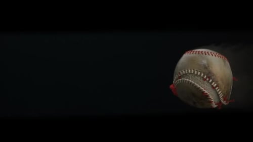 Weathered Baseball Rotating Slowly Against a Black Backdrop