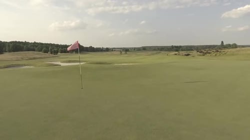 Aerial View of Large Luxury Golf Course. View of the Green Lawns and Trees. Shooting From Above