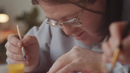 Adult Paints Art Project Close Up