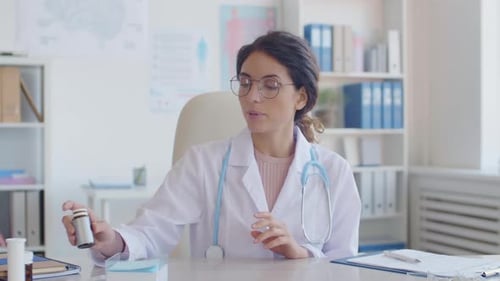 Doctor Explains Medication in Telemedicine Appointment