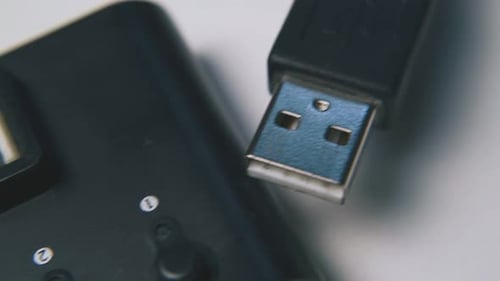 Black Usb Hub in Plastic Case on Clean Light Background