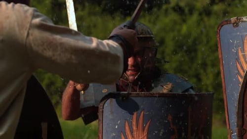 Roman Soldiers Engaged in a Sword Fight in Rain