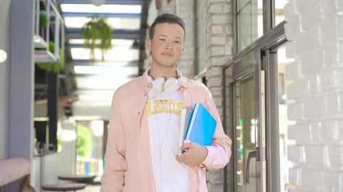A young man in a cafe.
