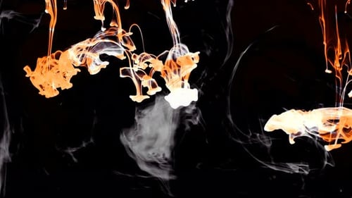 Abstract Orange and White Ink Dropping into Water