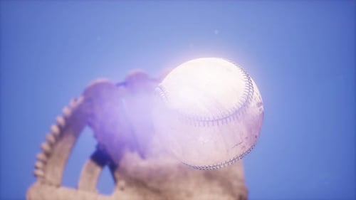 Baseball and Mitt at Blue Sky Background