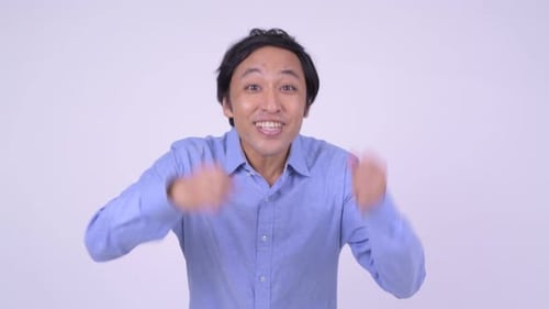 Man Celebrates Success With Joyful Exuberance