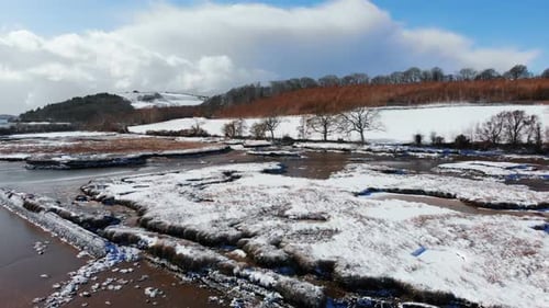 Beautiful river and snowy landscape during winter 4k