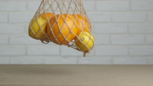 Cítricos en bolsa de malla