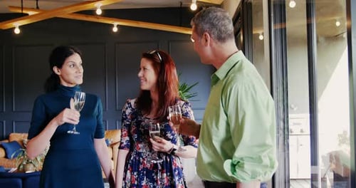 Adults Celebrating with Champagne at a Party