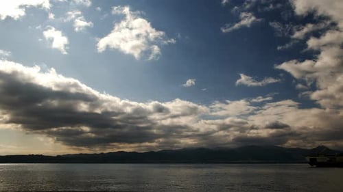 Clouds Sea And The Ferryboats On Dock