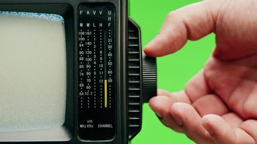 Small Old Television with Grey Interference Screen on Chroma Green Background