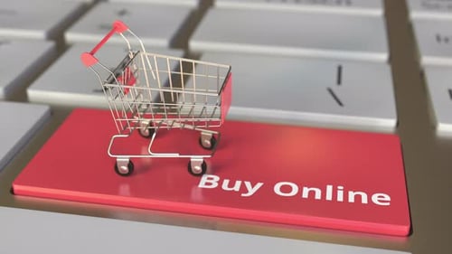 Buy Online Text on Computer Keyboard and Boxes in Shopping Cart