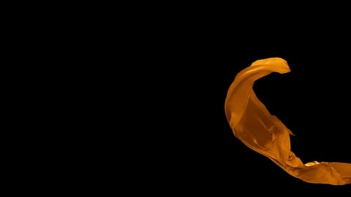Gold Fabric Flowing on Black Background