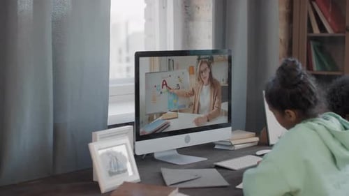 Children Learn Online at Home Computer