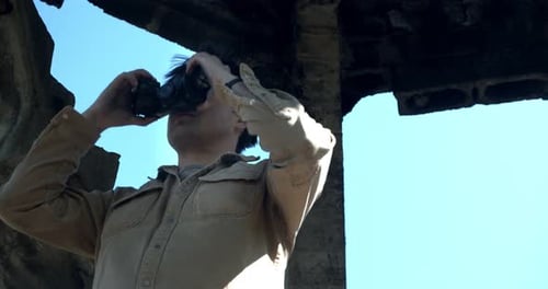 Man Wearing Gas Mask in Post-Apocalyptic Ruins
