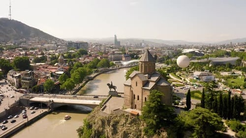 Aerial View of City with River and Building