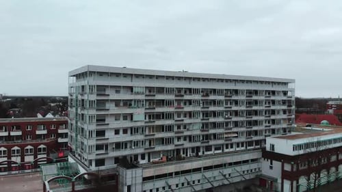 AERIAL of urban residental house revealing cute little city and houses in the background