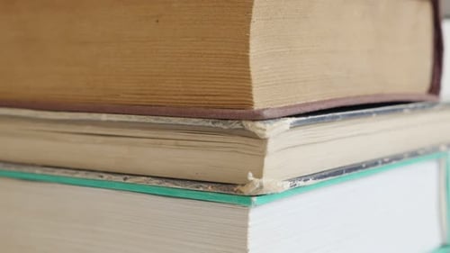 Stack of Well-Worn, Aged Hardcover Books
