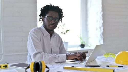 Architect Working on Laptop Says No