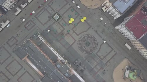 AERIAL: Birds Overhead View of Krakow, Poland Old Town, Rynek Glowny in Winter, Snow