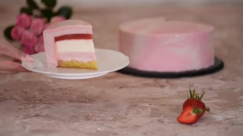 Serving a Pink Birthday Cake Slice
