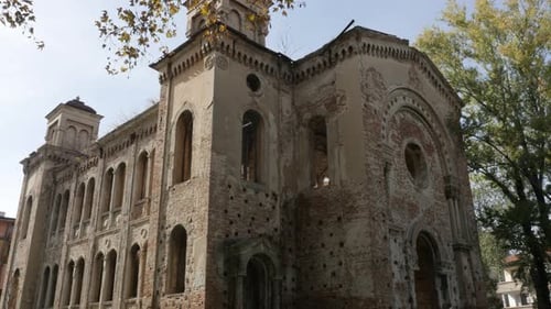 Jewish house of prayer bombed in WW2 slow tilt 3840X2160 UltraHD footage - Old synagogue in town o