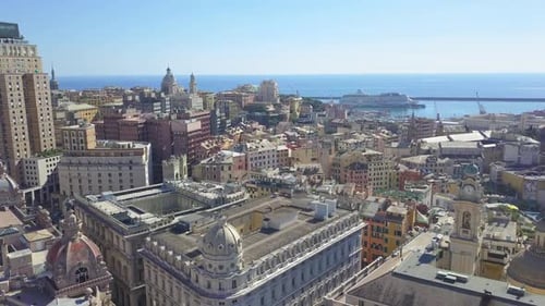 Aerial panoramic view of buildings,streets surrounding Port of Genoa.Important hub of maritime trade