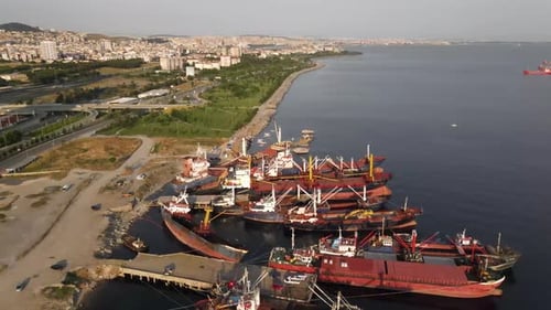 Container Ships Docked at City Coastline