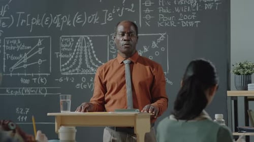 Professor Giving Math Lecture to Students