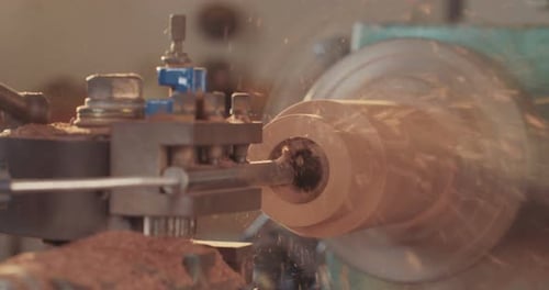 Wood Being Crafted by Lathe Machine