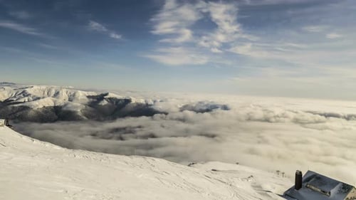 Snowy Mountains Landscape Above the Clouds