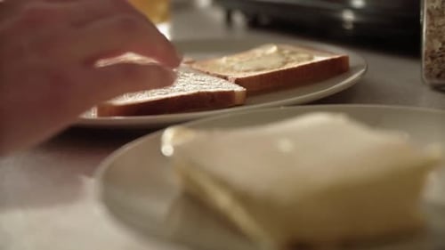 Preparing Breakfast: Toast and Butter