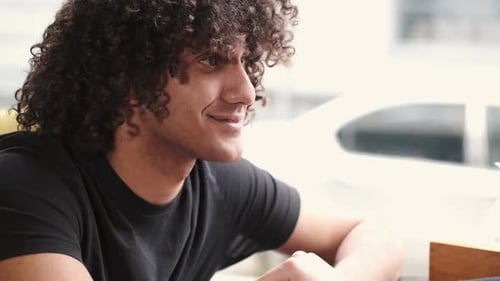 Loving Couple Enjoying Time in a Cafe Together