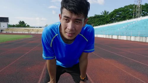 Sportsman Resting After Running