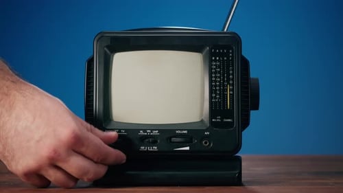 Black Retro Television with Static on Dark Background