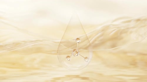3D Golden Droplet with Rotating Molecule Animation