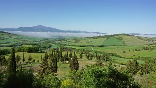 Fog Over Farmland Hill Country in Tuscany