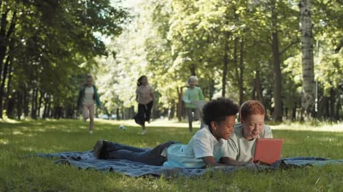 School Girls Joining Boys in Park