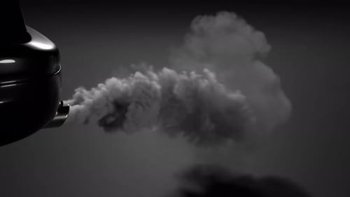 Car Exhaust Pipe Emitting Fluid Smoke